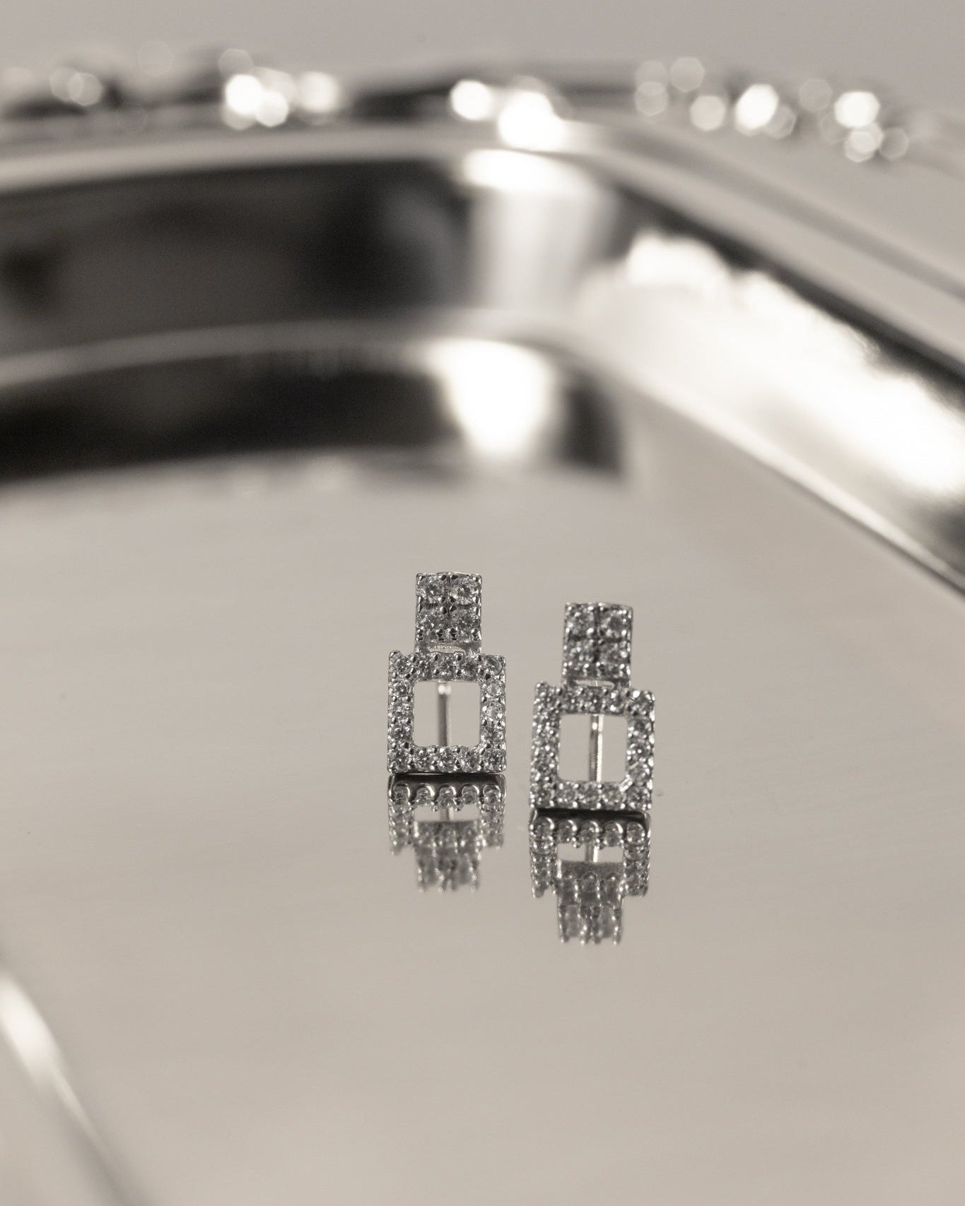 Aretes de doble marco cuadrado con cristales en plata