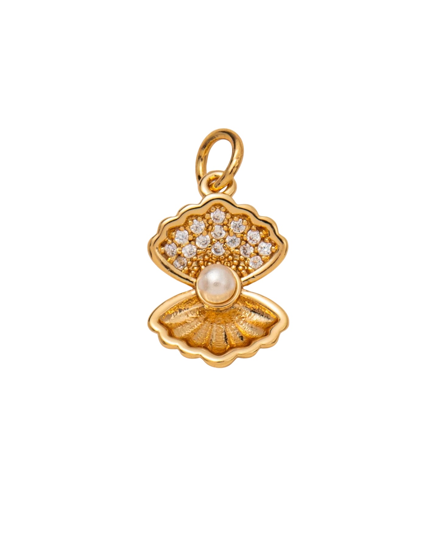 Dije de concha marina dorada con pavé de cristales y perla central