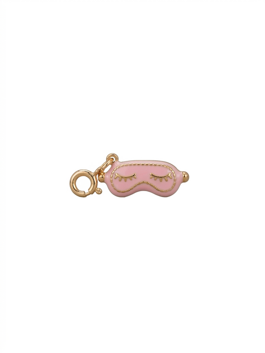 Dije de antifaz para dormir en color rosa y dorado