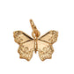 Dije de mariposa dorada con textura