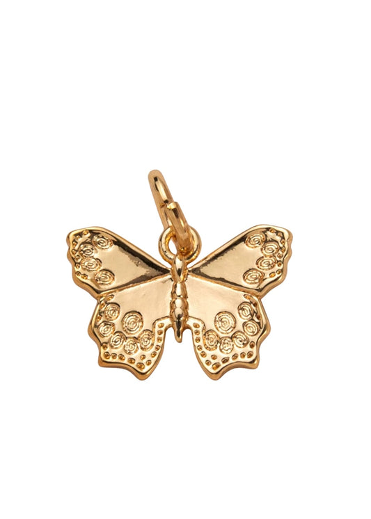Dije de mariposa dorada con textura