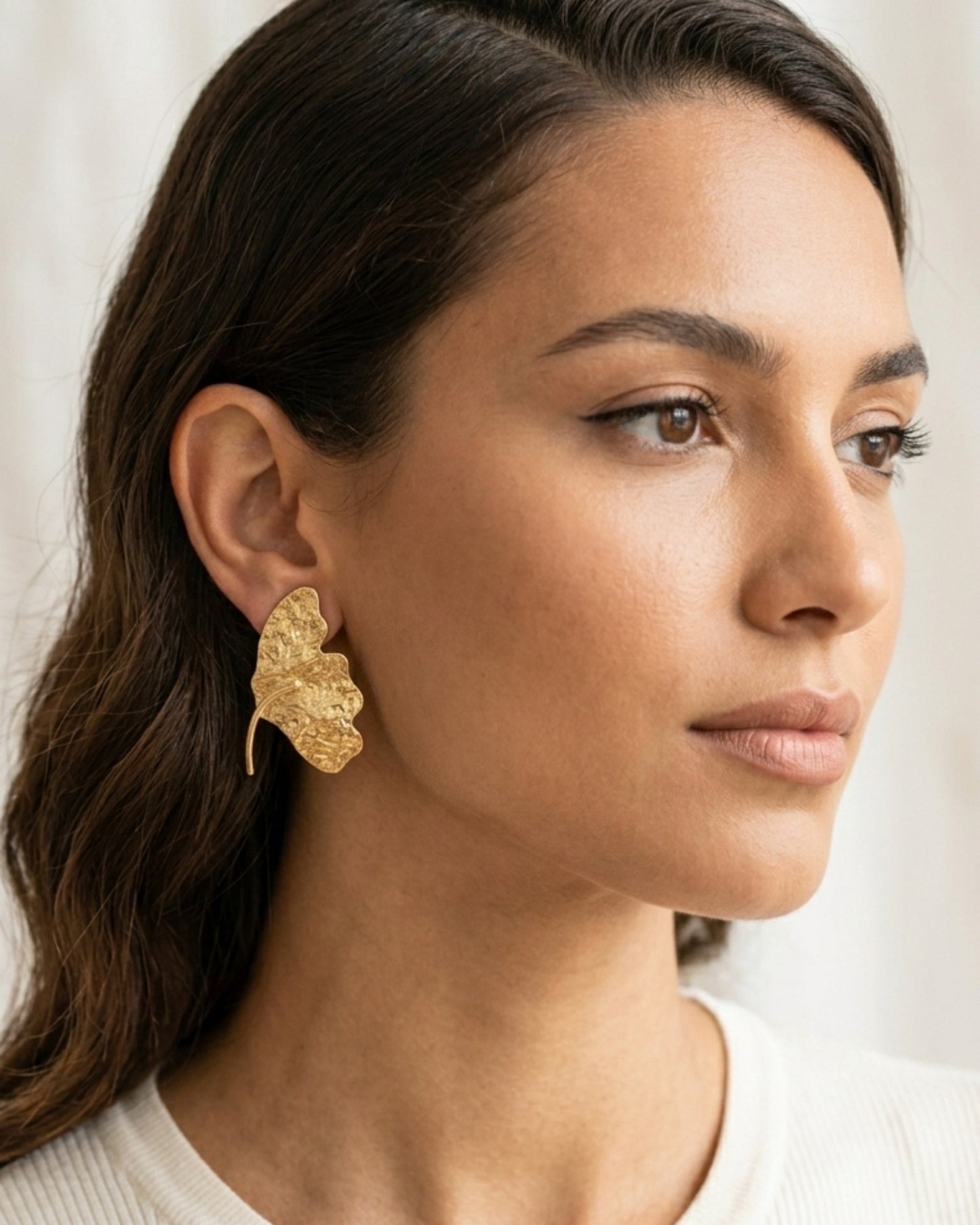 Aretes de hoja dorado en acero inoxidable