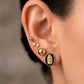 Arete tipo broquel de la Virgen de Guadalupe con deposito de color negro en oro 10k