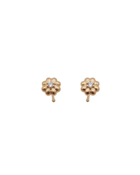 Arete tipo broquel de flor miniatura con cristales en pavé en oro 10k