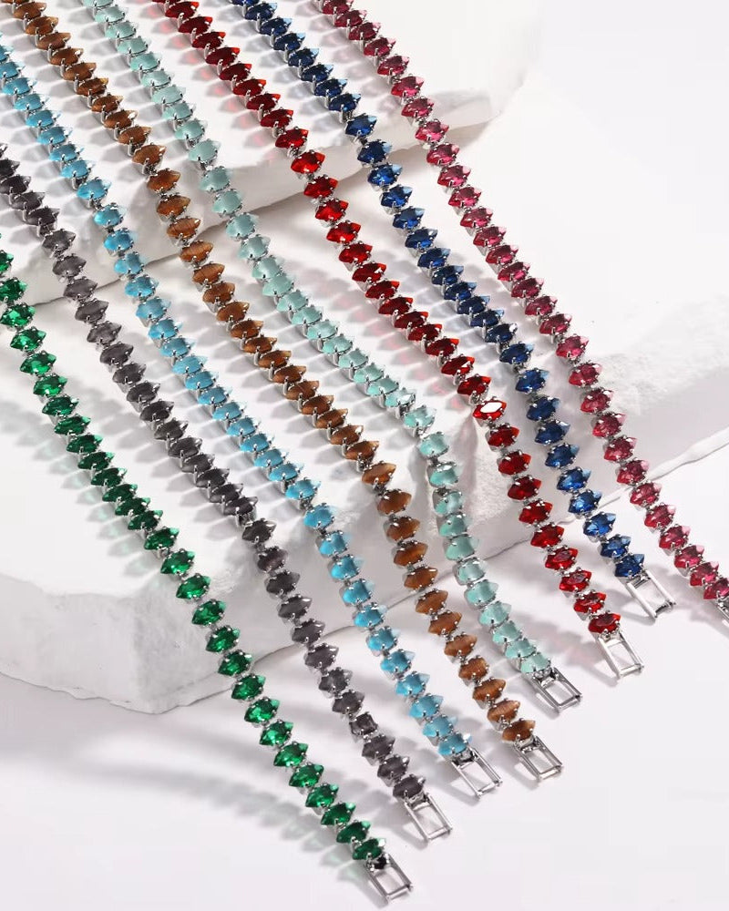 Pulsera estilo tennis de chapa de oro con circonias verdes