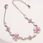 Pulsera Plateada de Flores con Cristales