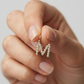 Dije Colgante de Letra "M" con Circonitas en Tono Dorado