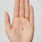 Dije iniciales Puffy en dorado
