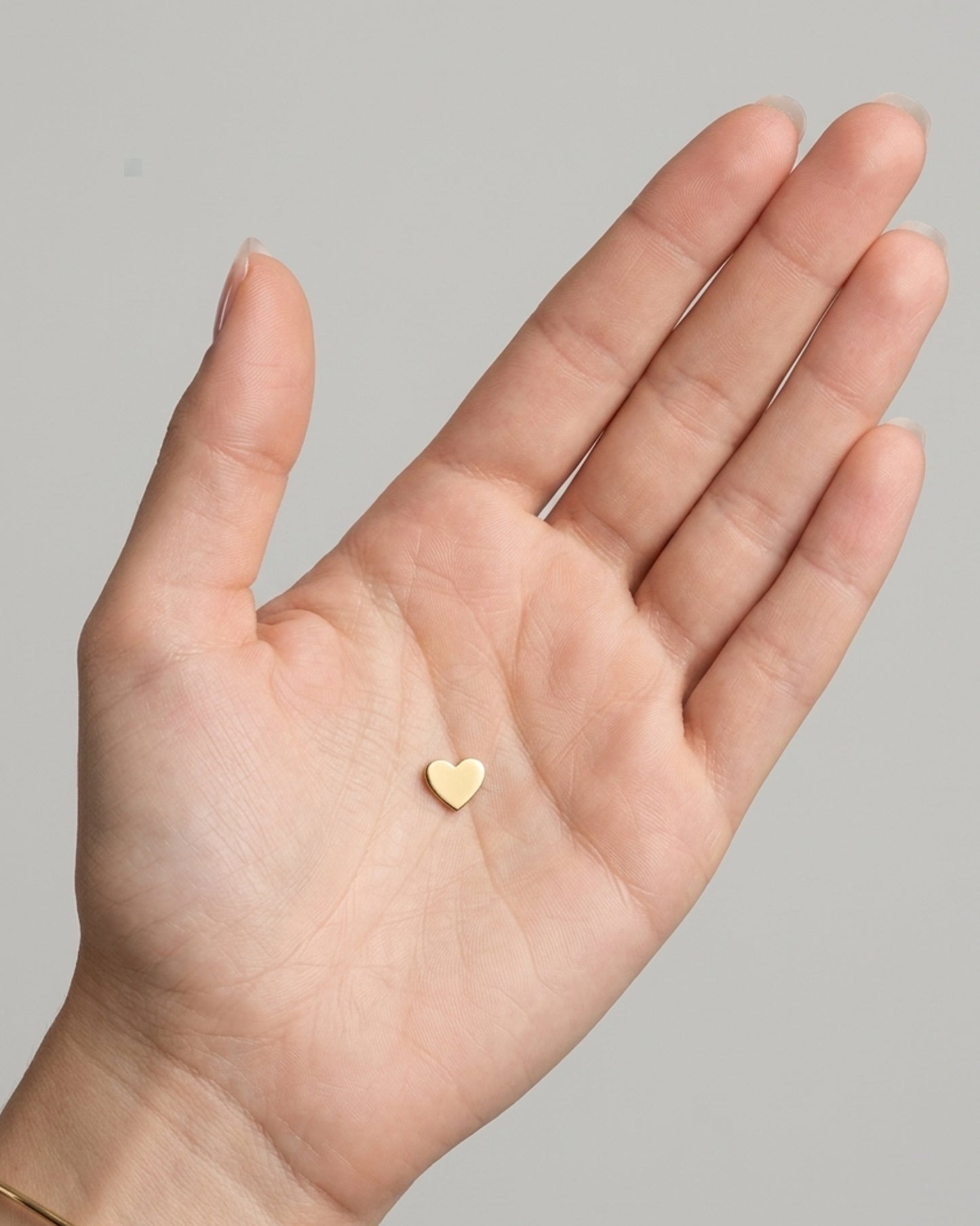 Dije de corazón "Puffy" en dorado