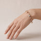 Pulsera de doble cadena con estrellas tricolor en oro 10K