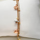 Pulsera de doble cadena con estrellas tricolor en oro 10K