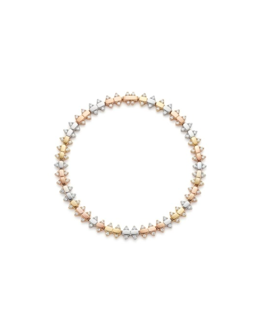 Pulsera articulada tricolor con detalles de circonias en oro 10K