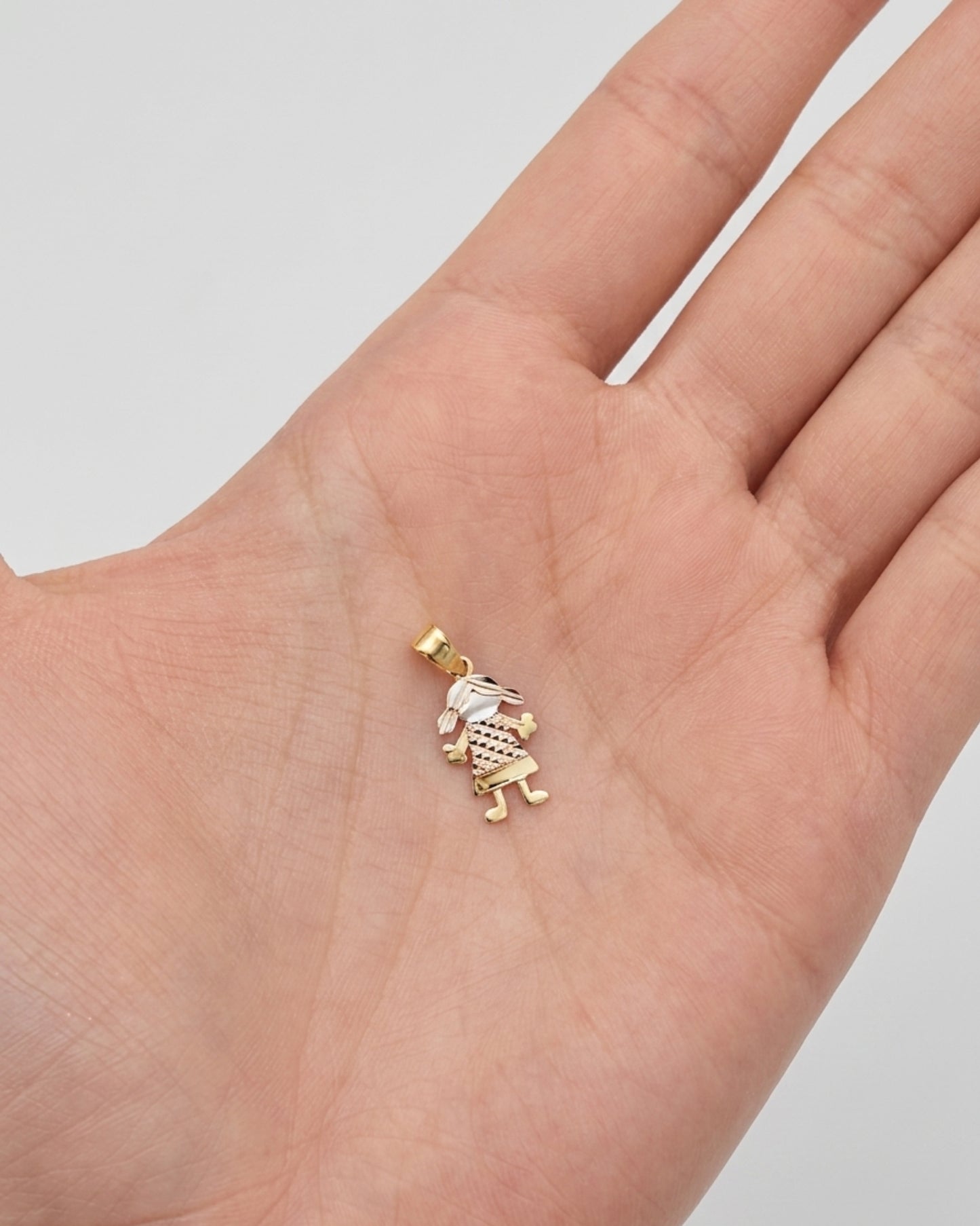 Dije Silueta Niña en Oro Rosa y Oro Dorado 10K con Acabado Diamantado