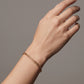 Pulsera de eslabón plano entrelazado en oro 10K