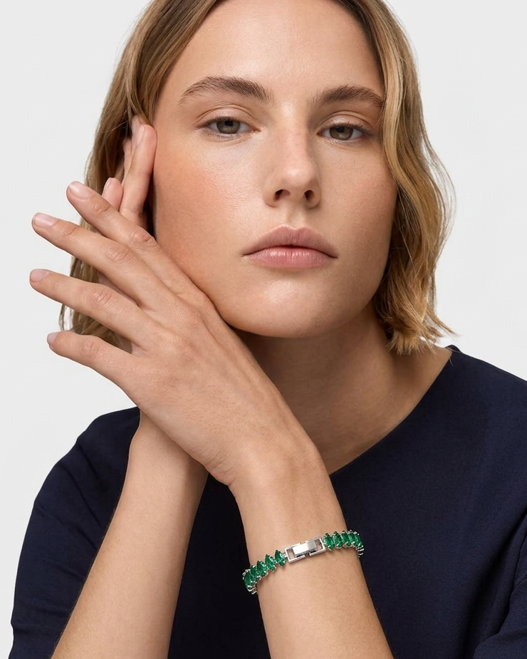 Pulsera estilo tennis de chapa de oro con circonias verdes