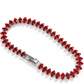 Pulsera estilo tennis de chapa de oro con zirconias rojas