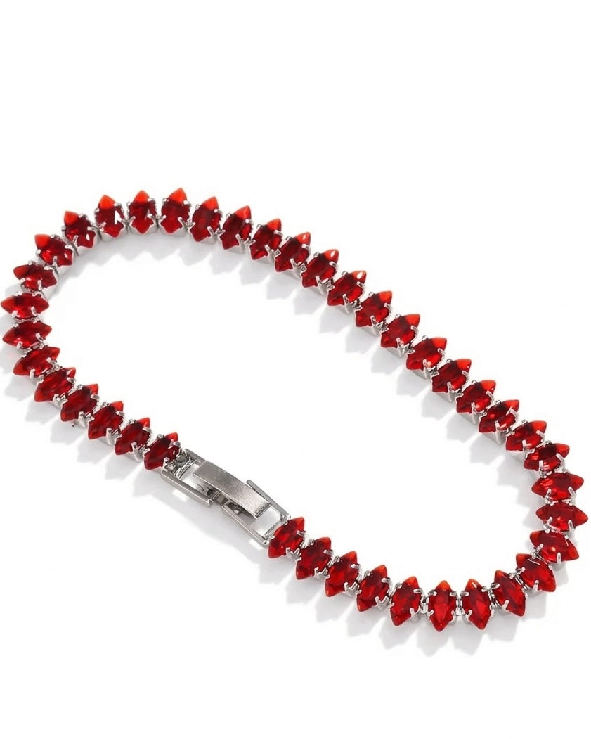 Pulsera estilo tennis de chapa de oro con zirconias rojas
