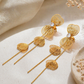 Aretes colgantes de mariposa en filigrana y cristales