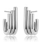 Aretes plateados de triple línea tubular con diseño asimétrico