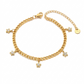Pulsera de cadena dorada con dijes de estrella y destellos
