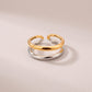 Anillo de doble banda bitono con silueta minimalista