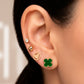 Arete tipo broquel de cristal con borde estriado en relieve en oro 10k