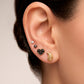 Arete tipo broquel de gota con textura martillada en relieve en oro 10k