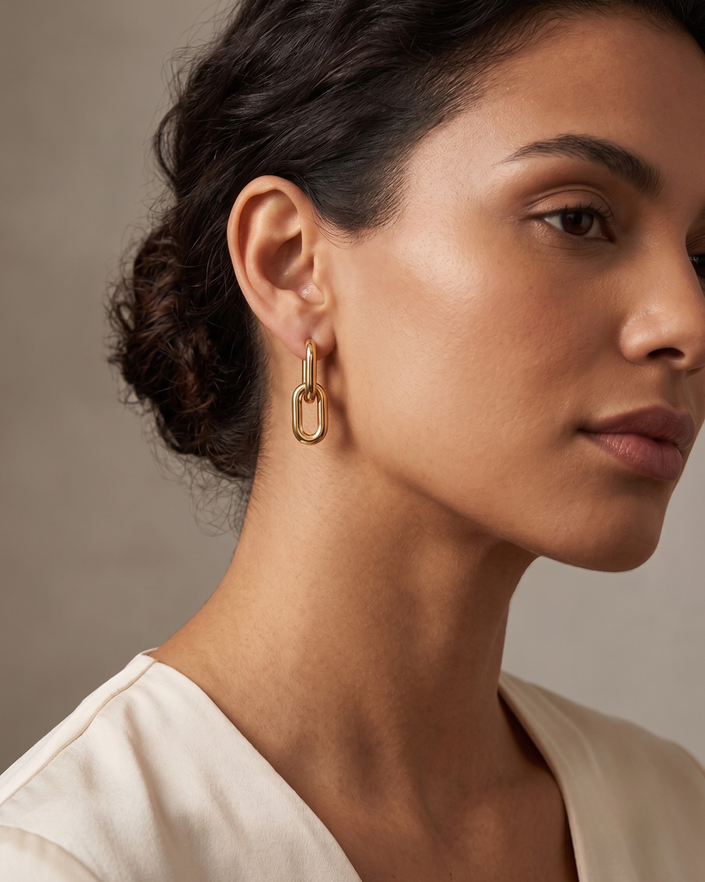 Aretes Eslabón Fluido Dorados