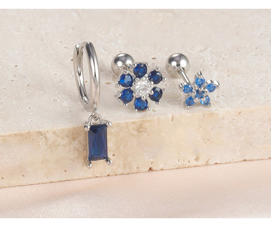Conjunto de aretes de flor, con piedra zirconia en color azul, tipo huggie y studs