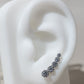 Aretes trepadores de cristales graduados en plata