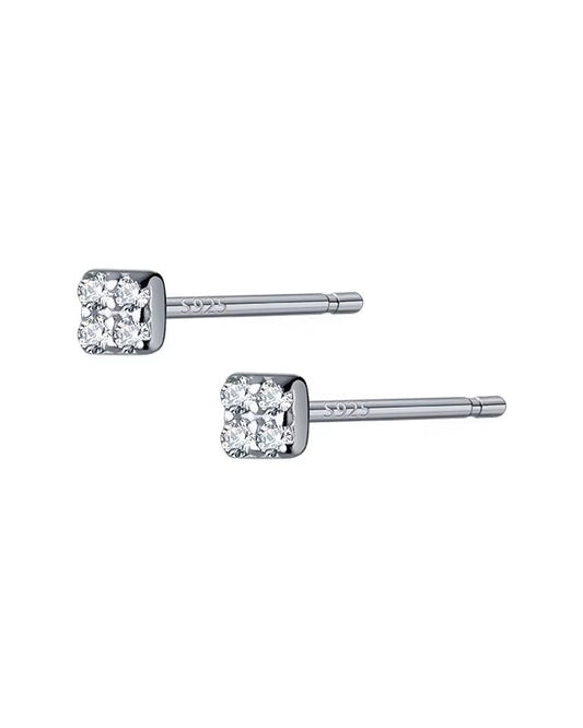 Aretes tipo studs con zirconias celeste color plateado