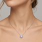 Collar de plata con cristal central amatista y halo brillante