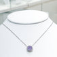 Collar de plata con cristal central amatista y halo brillante