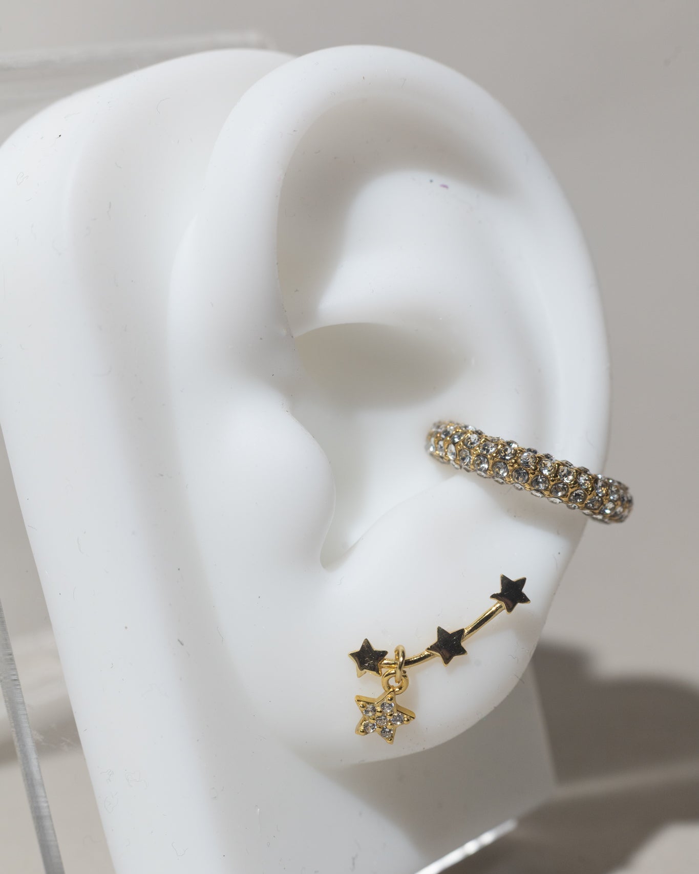 Aretes trepadores de estrellas con dije colgante en oro rosa