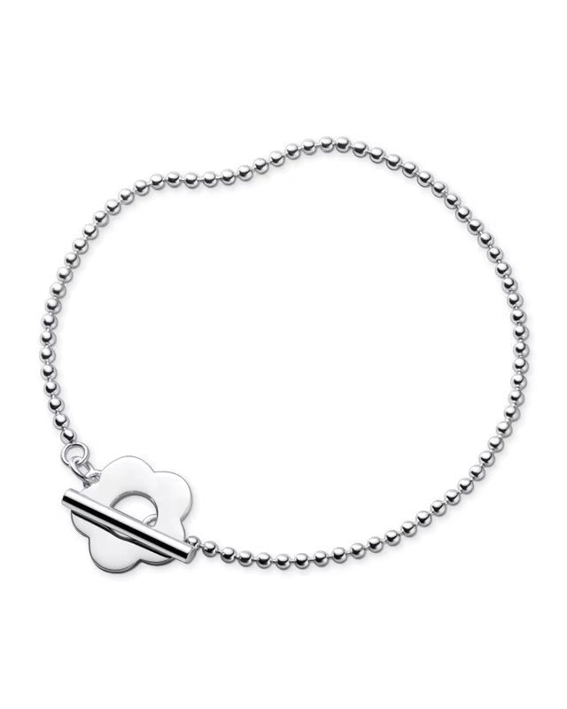 Pulsera con broche de flor color plateado