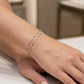 Pulsera doble de eslabones color plateado
