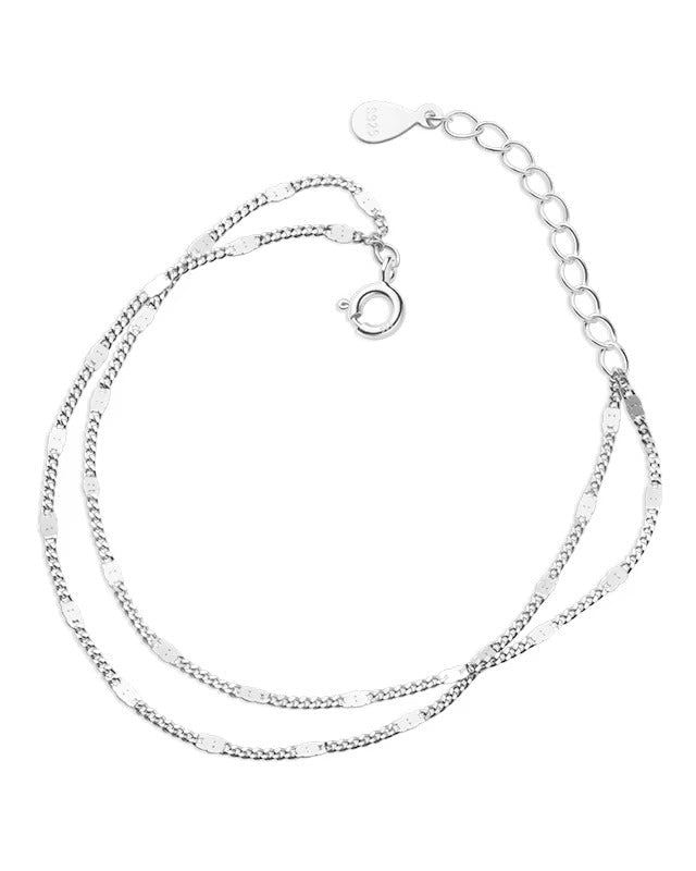 Pulsera doble de eslabones color plateado