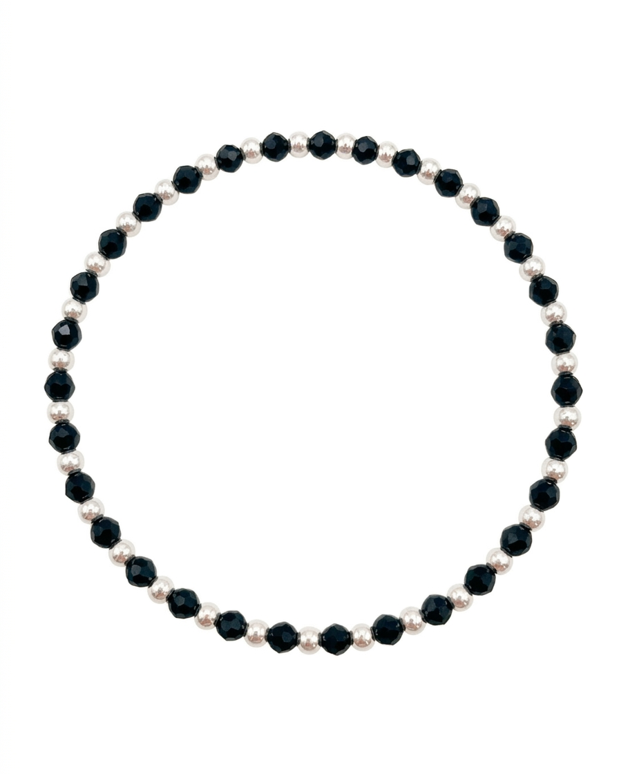 Pulsera de esferas plateadas y cristales facetados en negro