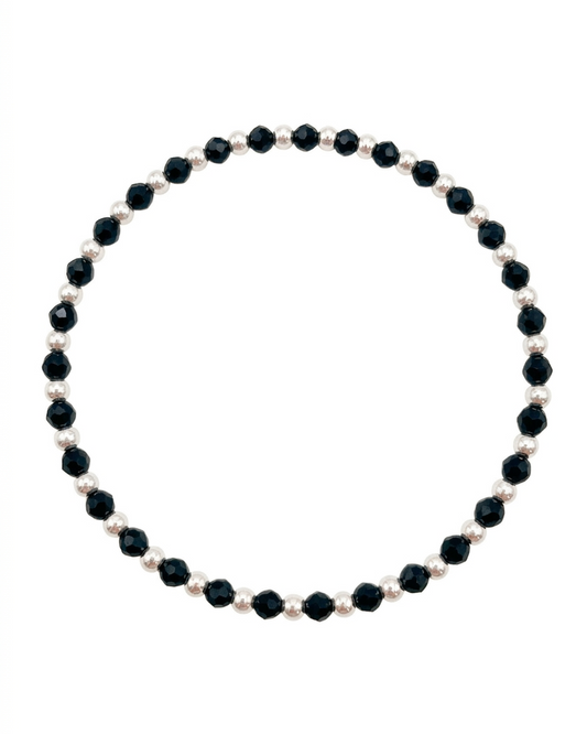Pulsera de esferas plateadas y cristales facetados en negro