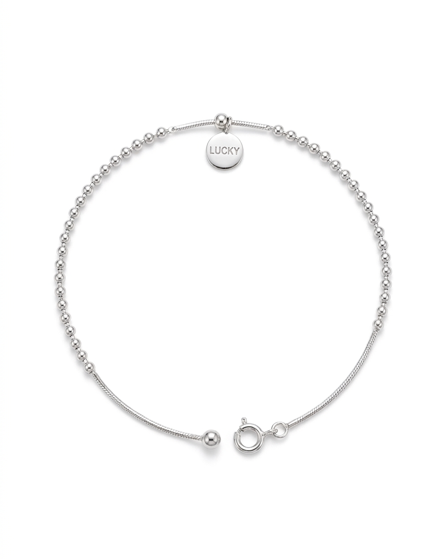 Pulsera de esferas y cordón plano con dije Lucky