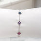 Pulsera de tréboles de colores con piedras incrustadas