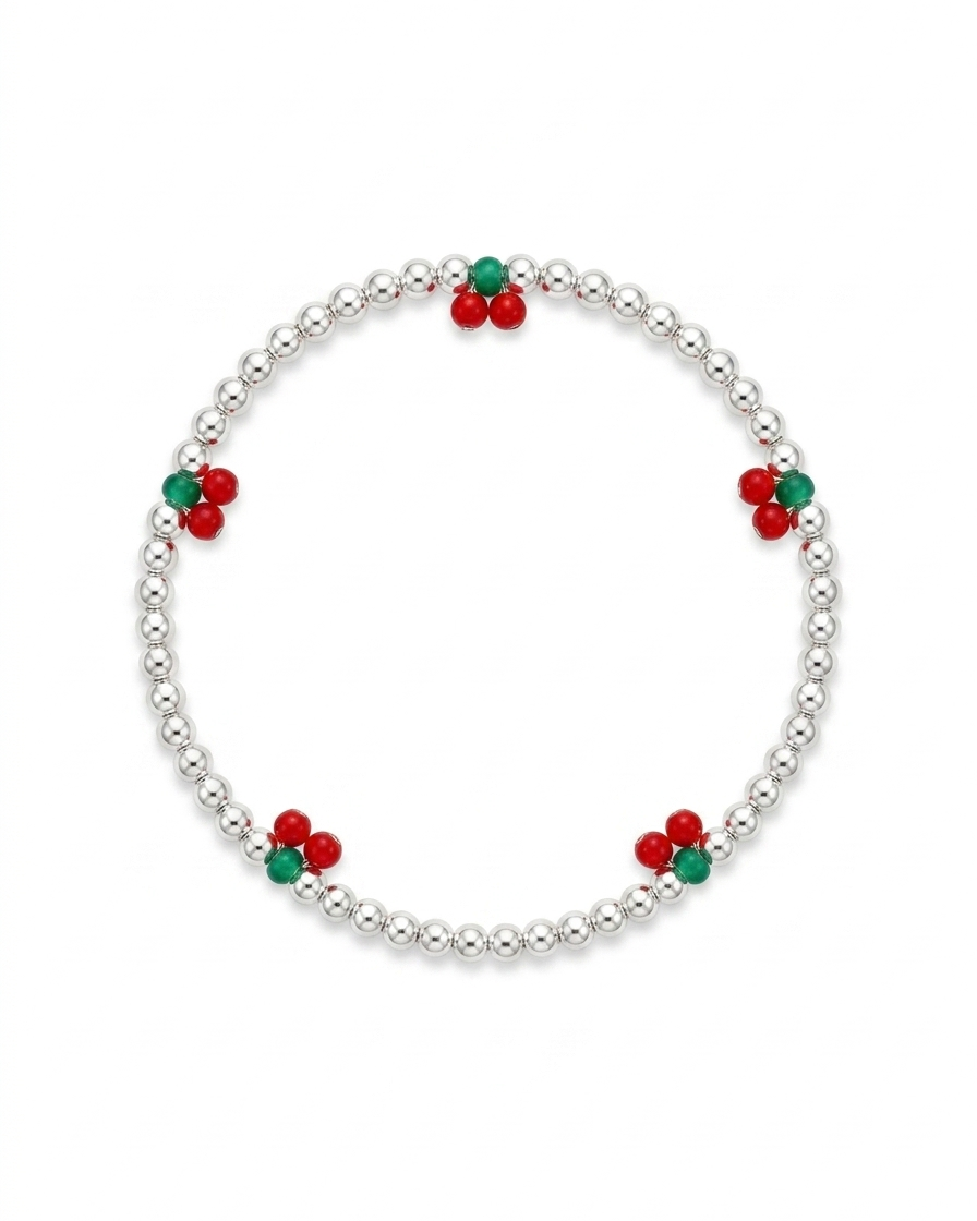 Pulsera de esferas plateadas con dijes de cereza en resina