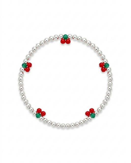 Pulsera de esferas plateadas con dijes de cereza en resina