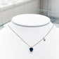 Collar de corazón en cristal azul medianoche con dije pequeño de corazón