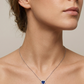 Collar de corazón en ópalo azul con halo de cristales