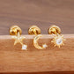 Studs dorados con forma de estrellas y luna