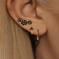 Conjunto de aretes de zirconia color negro tipo huggie y studs