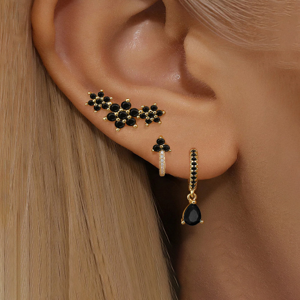 Conjunto de aretes de zirconia color negro tipo huggie y studs