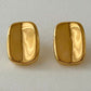 Aretes rectangulares con acabado tipo espejo
