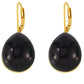 Arete bohemio en color dorado con negro, de tipo drop earrings.